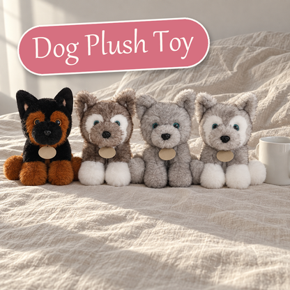 Dog Plush Toy - four sitting puppy plush in black and tan, dark grey, all grey and light grey on linen bedding with a mug for scale