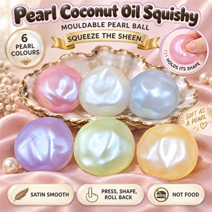 Pearl Coconut Oil Squishy poster - six mouldable coconut-oil balls with a mother-of-pearl sheen in an oyster shell on blush satin
